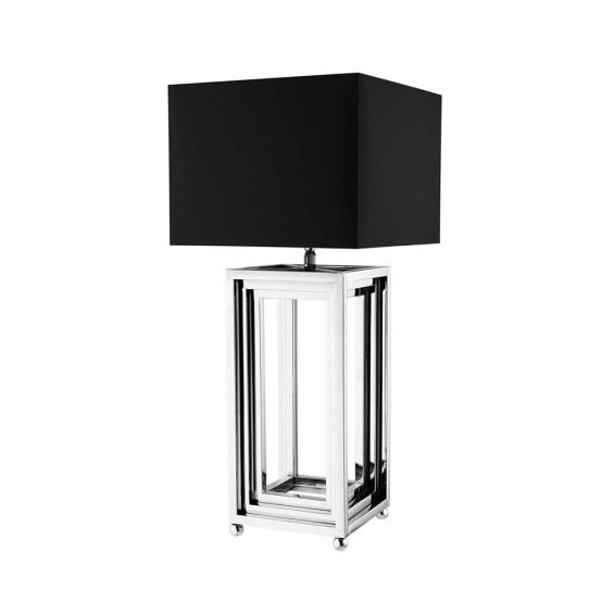 A contemporary and chic table lamp with a nickel frame and black lampshade