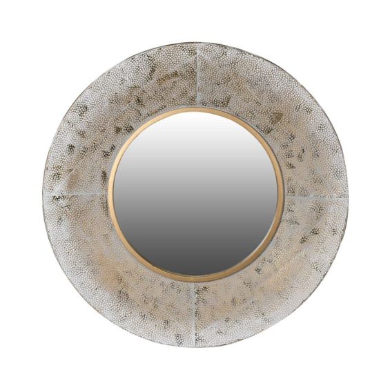 A unique round mirror with glamorous golden tones
