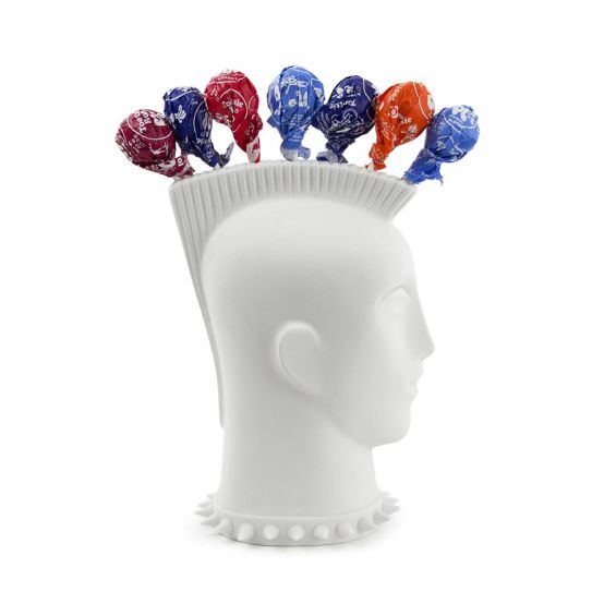 A white porcelain punk-inspired mohawk lollipop holder