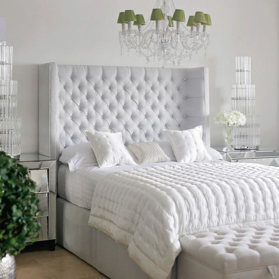 Deep buttoned and winged headboard