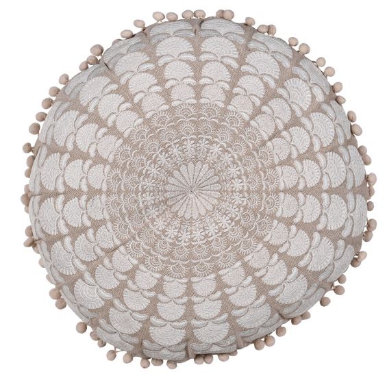Circular brown and grey cushion with pom poms 
