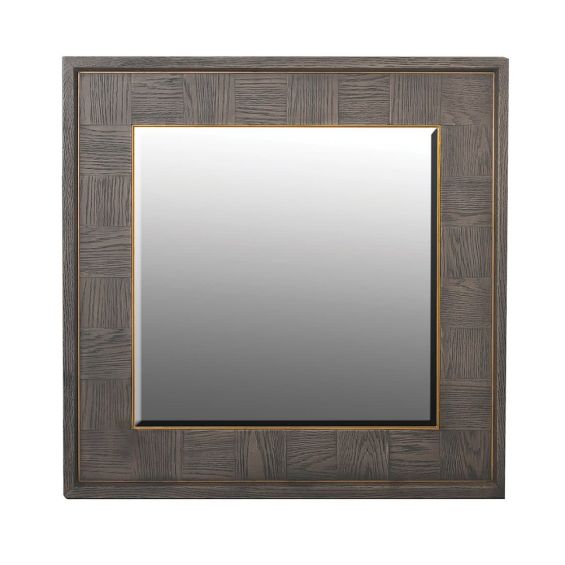 A contemporary wall mirror with checkerboard parquetry and brass details