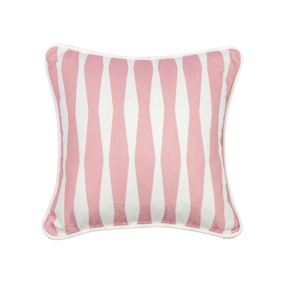 A beautiful children's cushion with a pretty pink design featuring a unique pattern and white piping