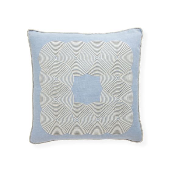 A beautiful pale blue cushion by Jonathan Adler with a modern 70s inspired pattern 