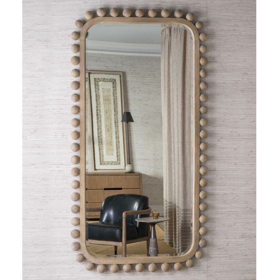 Large rectangular mirror lined with natural wooden solid spheres