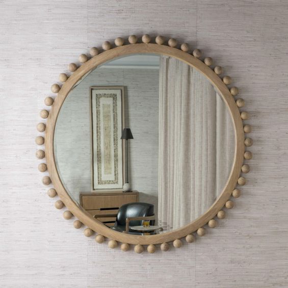 Circular mirror lines with natural wooden spheres 