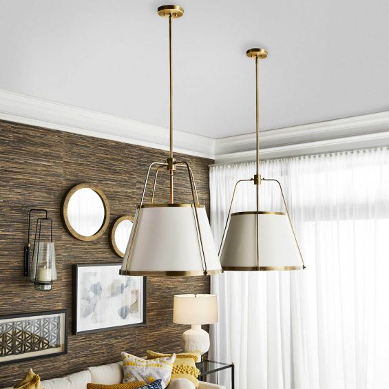 White ceiling light with brass frame details