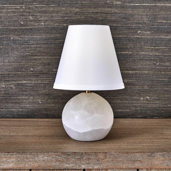 White circular alabaster lamp with linen shade