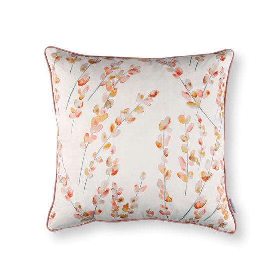 A beautiful, blush-coloured cushion with a floral design