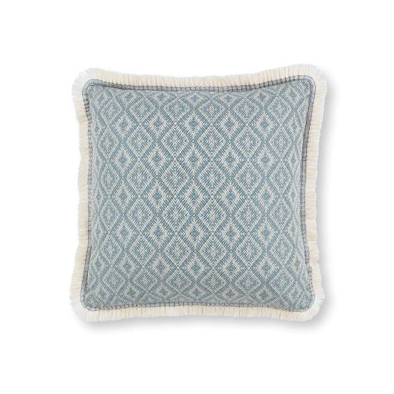 A jacquard woven outdoor cushion with a geometric pattern and cute fringe.