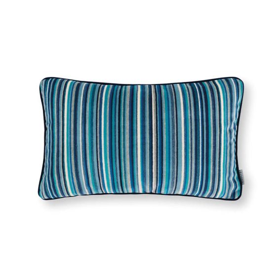A velvet outdoor cushion with various blue vertical stripes and dark blue piping.