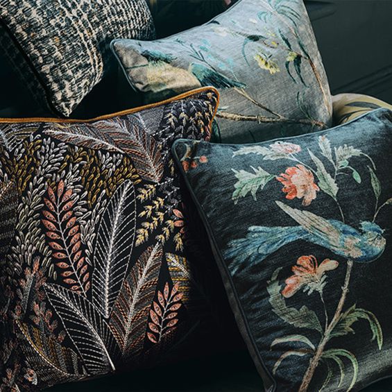 A delightful deep, dark and divine cushion featuring rich colour and a fabulous floral pattern