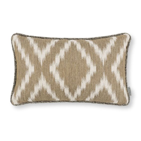 A neutral cushion by Romo with a geometric pattern and oatmeal finish