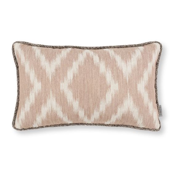 A beautiful blush coloured cushion by Romo with a gorgeous geometric pattern