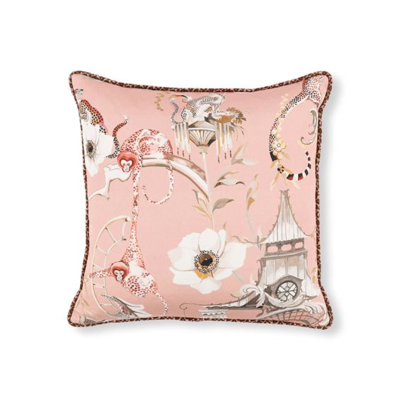 Pink cushion with chinoiserie inspired design and leopard piping 