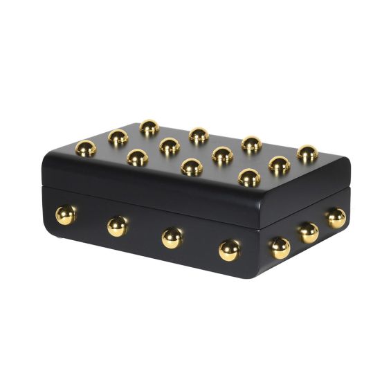 An elegant black box with golden studded details