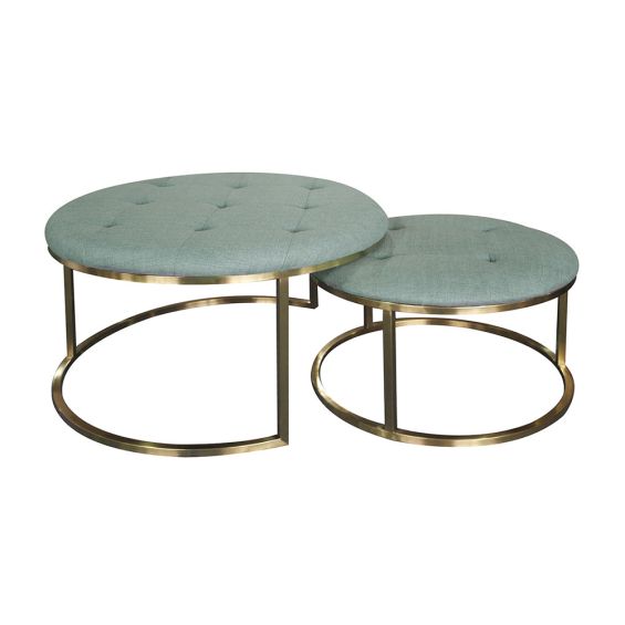 Sumptuous pouffe seating with deep buttoning and brass base frame