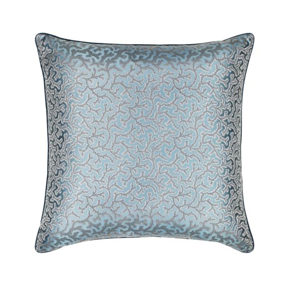 This luxurious, blue silk cushion features an elaborate, jacquard pattern with tailored piping along the edges. 