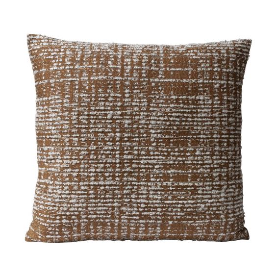 Brown/terracotta coloured cushion with white textured pattern