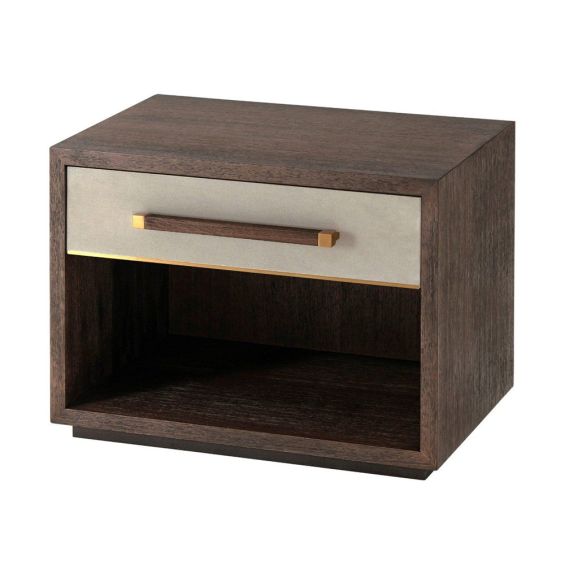 Elegant bedside table featuring drawer with brass details and shelf 