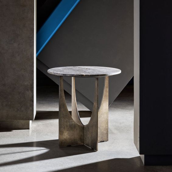 Optically-inspired side table finished in bronzed hue