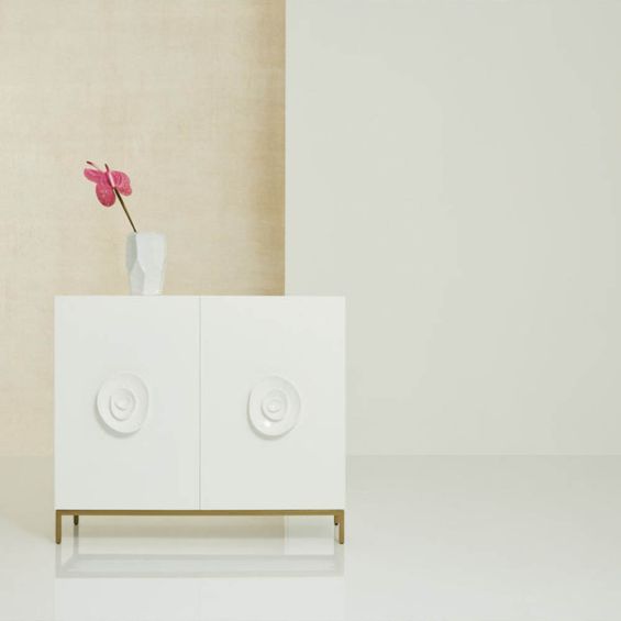 White textured sideboard with rose-inspired decorative pulls