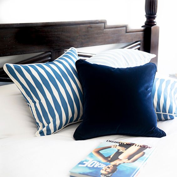 A divine dark blue velvet cushion 