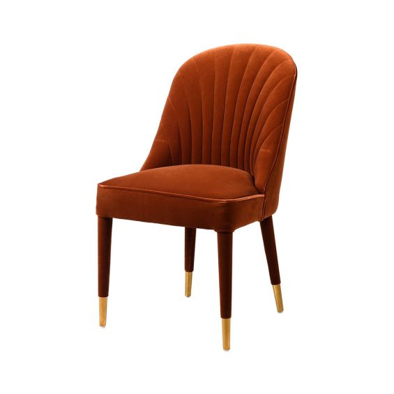 rust coloured retro dining chair with brass caps 