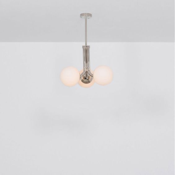 A chic, early century inspired LED pendant with translucent opal globes