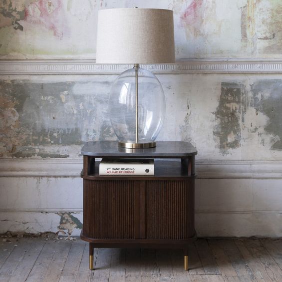 Retro-inspired bedside table with bluestone top and gold accent feet