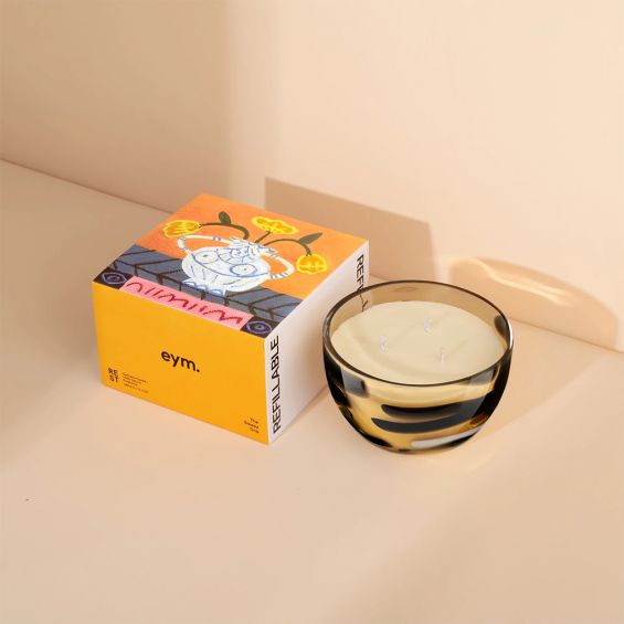 A gorgeous 100% natural and reusable candle by Eym with stunning hand-blown glassware