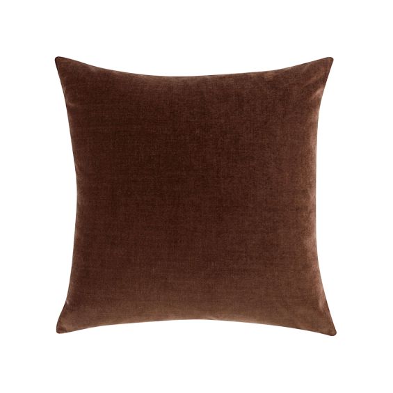 A rich red cushion with a soft velvet finish, linen reverse and feather insert