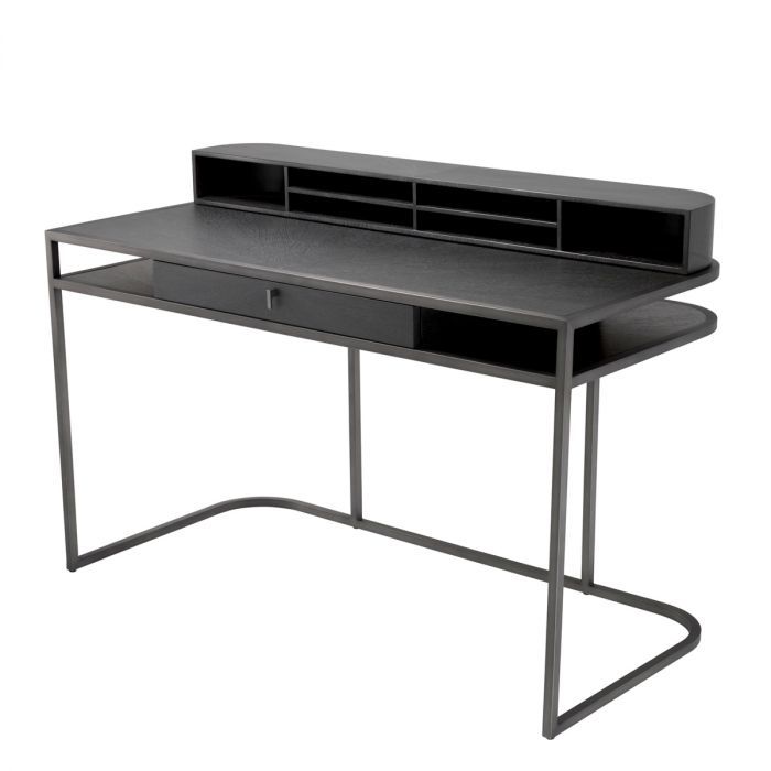 The Highland Desk, crafted from charcoal brown oak veneer, features a retro design with a metal frame and medium bronze finish.