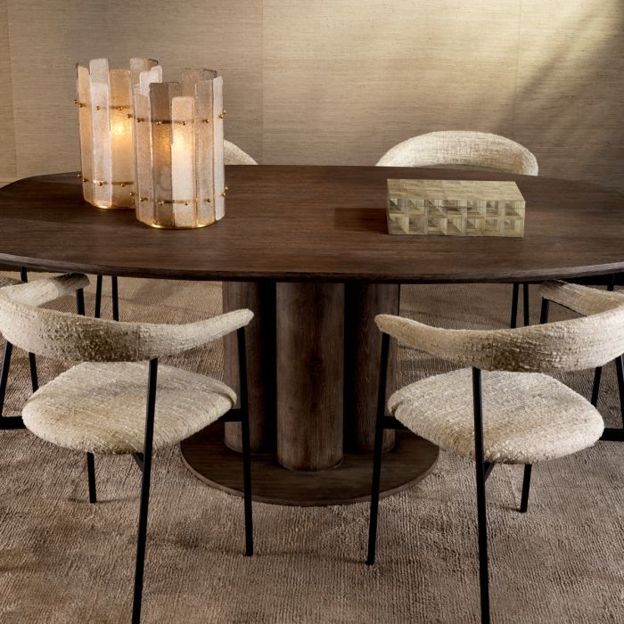 A contemporary dining table crafted from silverstone oak veneer