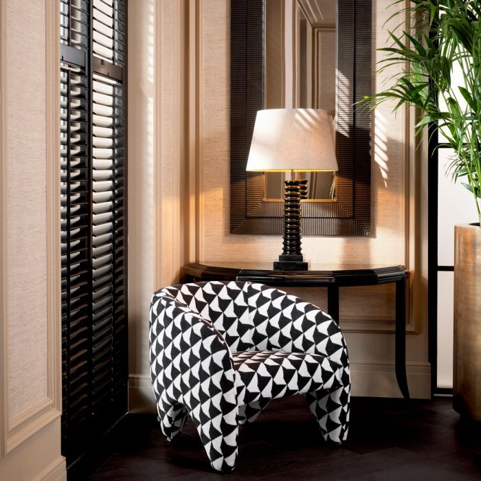 Striking chair featuring black and white geometric design