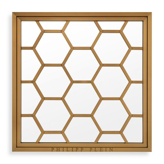 brass framed mirror with geometric design