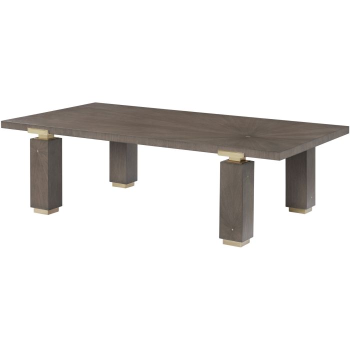 Dark wood dining table with gold accents and unique wood grain