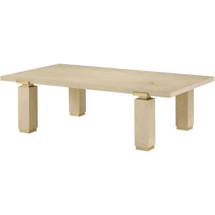 Light wood dining table with unique wood grain and gold accent joints