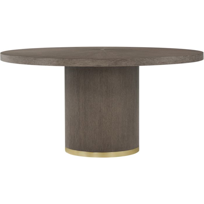 Dark wood dining table with gold accents