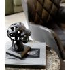 Artistically crafted sculpture of a panther head, with a black metal square base