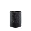Understated black metal candle holders with small hole details