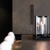 Floating wooden cabinet in walnut veneer and metal black frame
