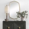 A gorgeous wall mirror by Uttermost with a golf leaf finish