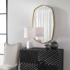 A gorgeous wall mirror by Uttermost with a golf leaf finish