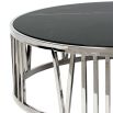 Elegant round coffee table with roman numeral details on nickel base frame