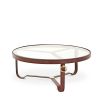 A luxurious leather and glass coffee table