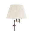 Contemporary floor lamp with adjustable top and brass and glass stand