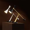 A stunning matte black and polished brass desk table lamp