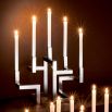 Structured silver candle holder with space for five candles