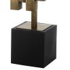 A stylish antique brass and black table lamp